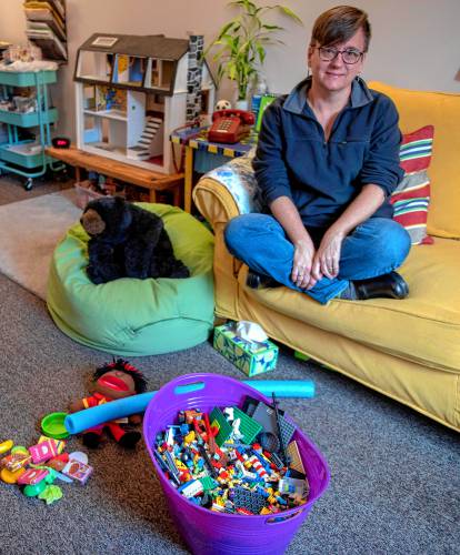 Alice Barber in her office in Easthampton, where she practices therapy for children. 