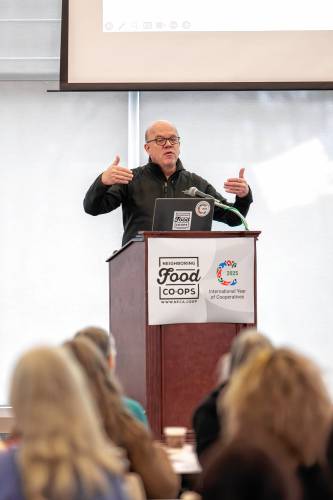 U.S. Rep. Jim McGovern discusses federal cuts with co-op members at the 14th annual Neighboring Food Co-op Association meeting at Greenfield Community College on Saturday.