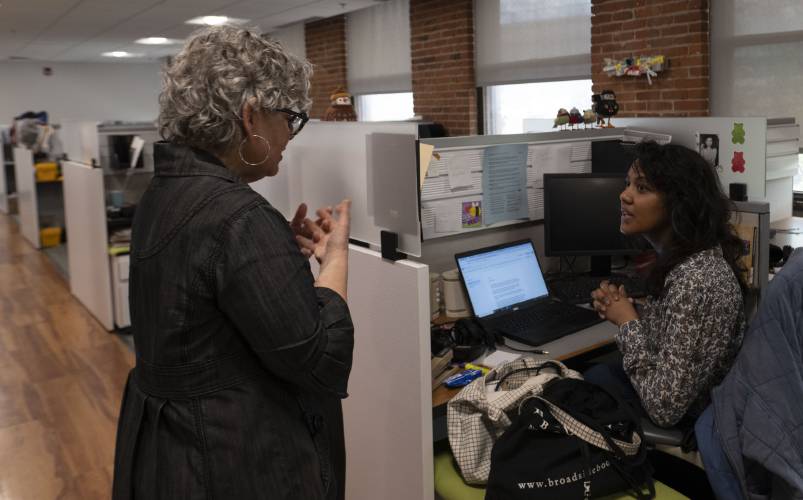 Jill Kaufman, a reporter with New England Public Media, edits a story with Nirvani Williams in Springfield. The Trump administration on May 1 issued an executive order that calls for funding cuts to the Corporation for Public Broadcasting, which includes National Public Radio and The Public Broadcasting Service.