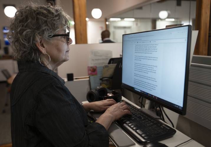 Jill Kaufman, a reporter with New England Public Media,  edits a story  in the Springfield station on Wednesday. 