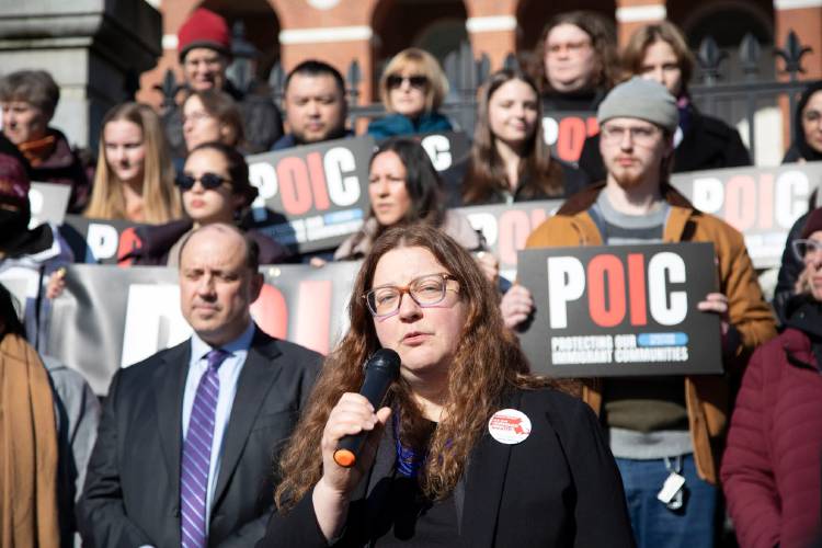 Elizabeth Sweet, executive director of the Massachusetts Immigrant and Refugee Advocacy (MIRA) Coalition, speaks at a rally outside the State House on Jan. 29, 2025. Elizabeth Sweet, executive director of the Massachusetts Immigrant and Refugee Advocacy (MIRA) Coalition, speaks at a rally outside the State House on Jan. 29, 2025.