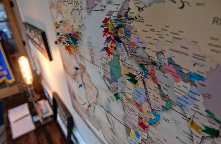 A map at the entrance of the Old Mill in Hatfield shows all the places people have come from to stay at the inn.