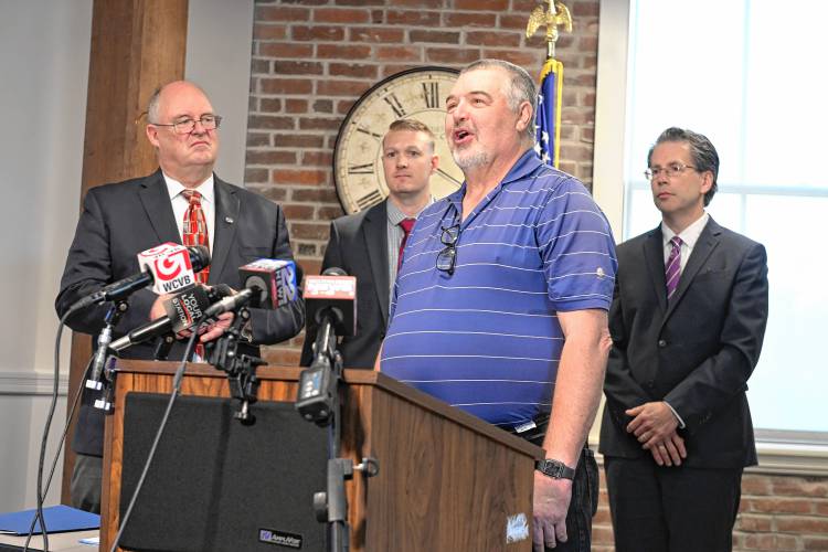 From left, Northwestern District Attorney David Sullivan, State Police Detective Paul Marguet, former Warwick Police Chief Brian Peters and First Assistant District Attorney Steven Gagne speak at press conference about the identity of a homicide victim found in Warwick in 1989 as Constance (Holminski) Bassignani.