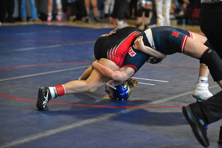 Frontier's Jocelyn Antes (right) competes against Exeter’s Kamie Hawkins at the Mahar Girls Wrestling Tournament in Orange on Monday.