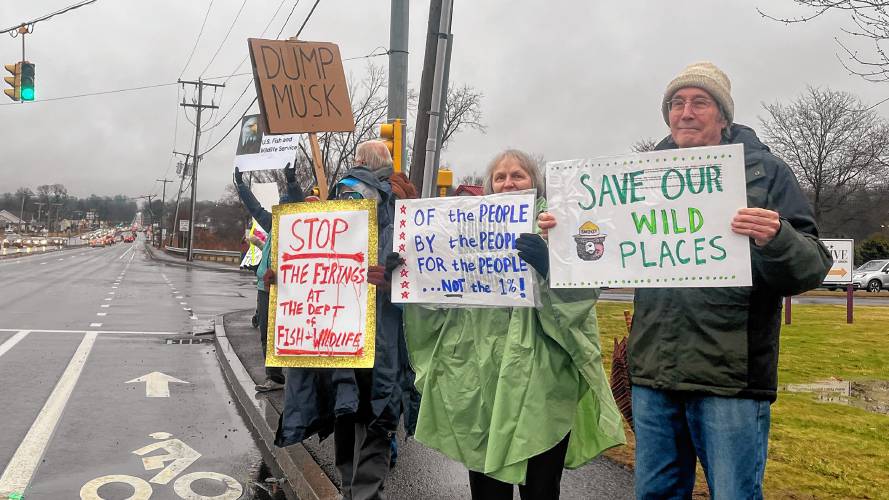 George Regmund and Stephanie Chapko join protest organzied by Swing Left Western Mass to show support for the fired and current U.S. Fish and Wildlife employees.