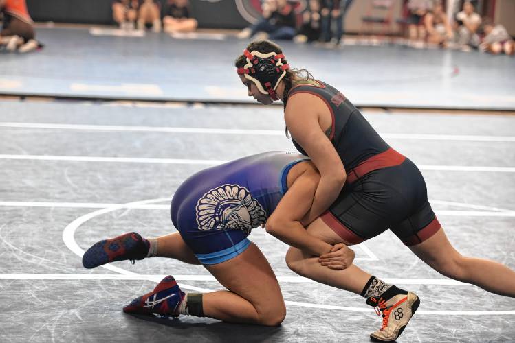 Mahar's Delana Fausett (right) competes against Scituate’s Faith Dumont in the Mahar Girls Wrestling Tournament in Orange on Monday.