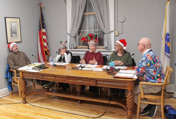 Members of the Orange Selectboard were feeling festive at their meeting on Wednesday, Dec. 18. Right to left are Clerk Andrew Smith, Vice Chair Pat Lussier, member Jane Peirce, member Julie Davis and Chair Tom Smith. The Selectboard voted unanimously this week to enter into a $3.6 million contract for the construction of a water tower at the Orange Industrial Park after Seaman Paper, the pulp and paper company poised to benefit from the structure, wired the town $790,000 earlier in the day to assist with the cost. Members of the Orange Selectboard were feeling festive at their meeting on Wednesday, Dec. 18. Right to left are Clerk Andrew Smith, Vice Chair Pat Lussier, member Jane Peirce, member Julie Davis and Chair Tom Smith. The Selectboard voted unanimously this week to enter into a $3.6 million contract for the construction of a water tower at the Orange Industrial Park after Seaman Paper, the pulp and paper company poised to benefit from the structure, wired the town $790,000 earlier in the day to assist with the cost.