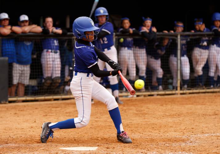 Turners Falls’ Marilyn Abarua (7) drives in the game winning-run against Greenfield in the bottom of the tenth inning Saturday during the MIAA Division 5 softball state championship at UMass.