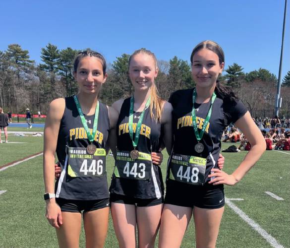 From left to right: Pioneer's Sahana Heilman, Emmanuelle Flagollet and Natalie Rios after setting Panther school records on Thursday in Foxboro. 