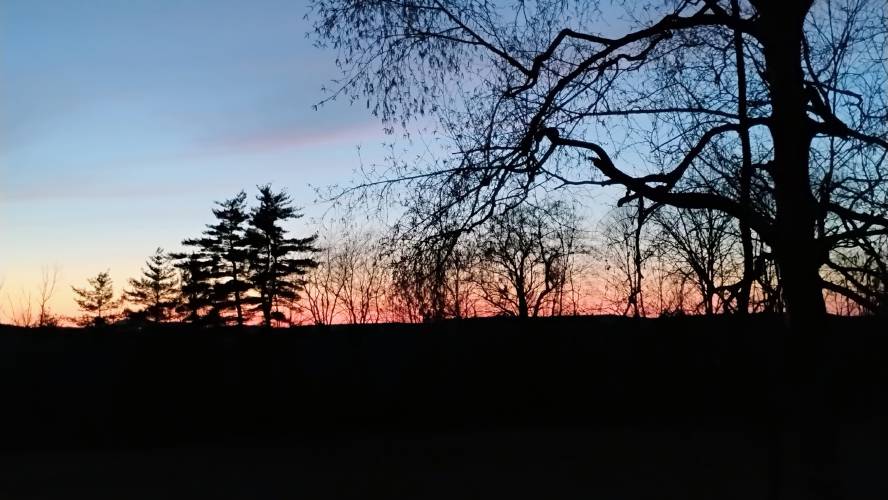 The sun sets behind the hills of North Quabbin, looking west from Chestnut Hill Avenue in Athol.