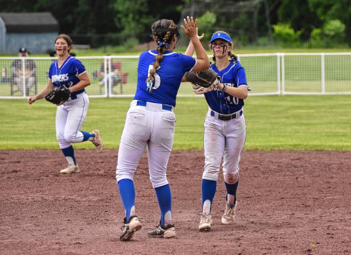 Turners Falls pitcher Madi Liimatainen (5) high-fives second baseman Addison Talbot after an out in the Thunder’s 11-4 victory over Narragansett in the MIAA Division 5 quarterfinal on Saturday at Gary Mullins Field.