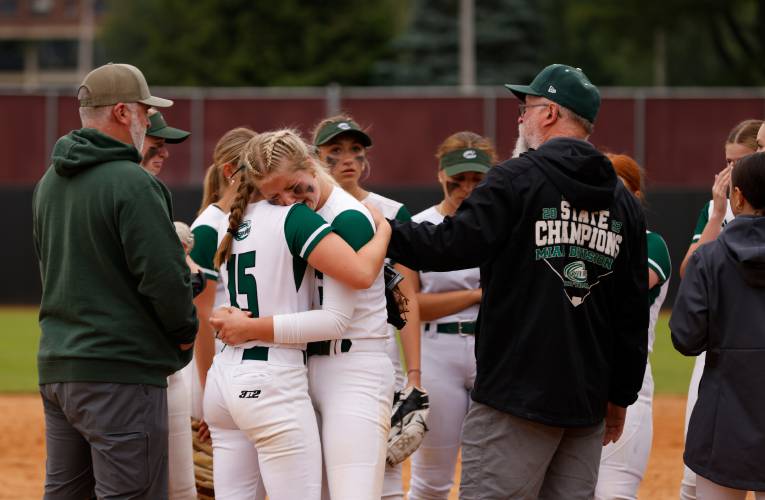 Greenfield players react after losing in extra innings to Turners Falls for the MIAA Division 5 softball state championship Saturday at UMass.