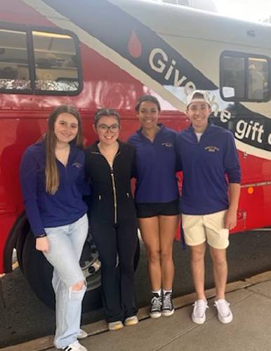 Montachusett Regional students (from left) Sophia Carlson, Chloe Hill, Isabella Williams and Evan McGrath helped with the Petersham Lions Club’s May 3 blood drive.
