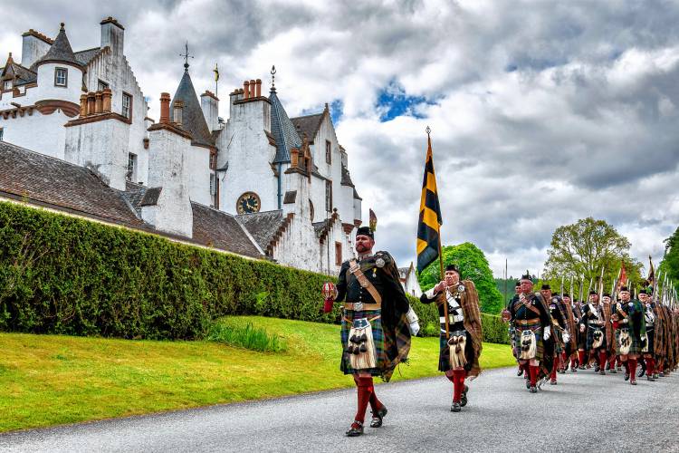 The Scottish Highlanders march at Blair Castle in Blair Atholl Scotland, led by Major Michael Murray, Marquis of Tullibardine, son of His Grace Bruce Murray, 12th Duke of Atholl. The Highlanders will arrive in Athol on April 9 as part of the River Rat Race.