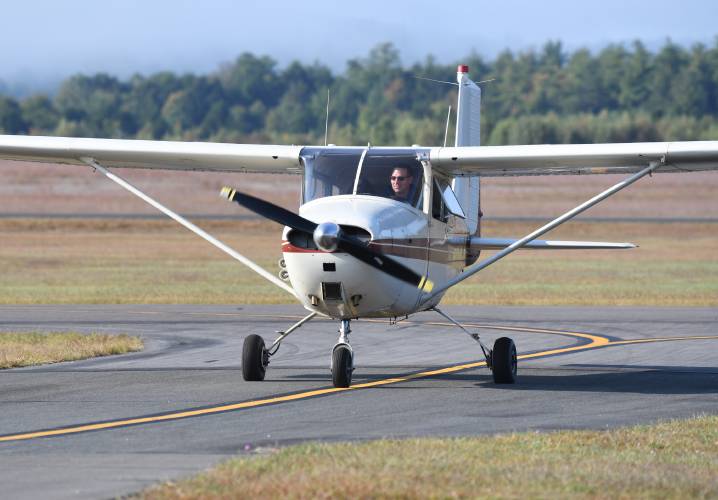 Pilot Chris Lucia gave tracking dogs rides at the Orange Airport. The event organized by the Northeast Houndsmen was to get the dogs used to the sounds and feel of flying in a small plane.
