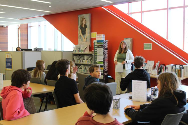 Mohawk Trail Regional School students visit the Greenfield Court Service Center on Thursday, where Manager Mary Klaes speaks about how they help people involved in civil cases research their legal options.