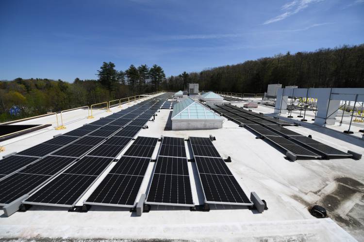 Solar panels populate the roof of Fisher Hill Elementary School in Orange. 