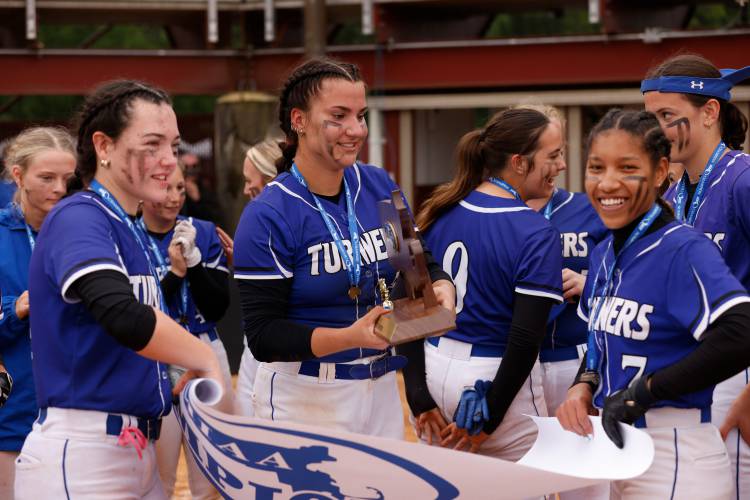 Turners Falls players celebrate after winning the MIAA Division 5 softball state championship Saturday at UMass.