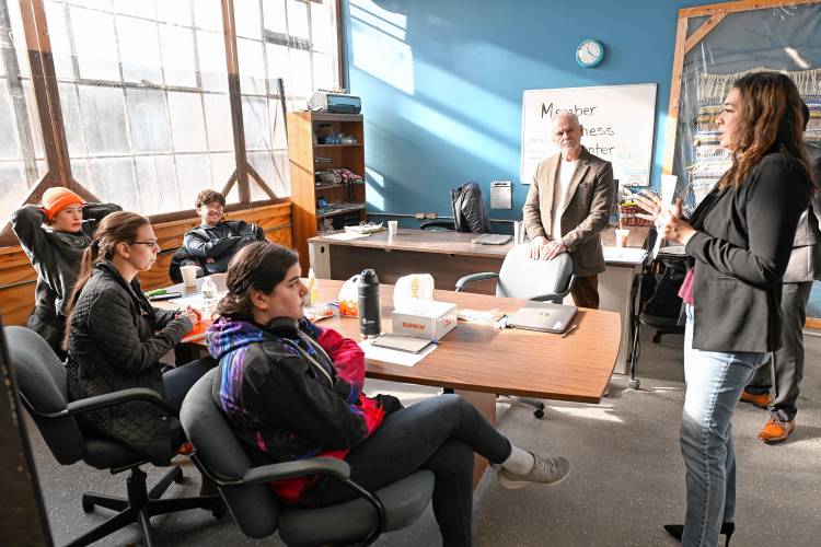 Glenn Davis and Catherine Comerford from the Workers Credit Union run a personal finance class at LaunchSpace in the Orange Innovation Center.