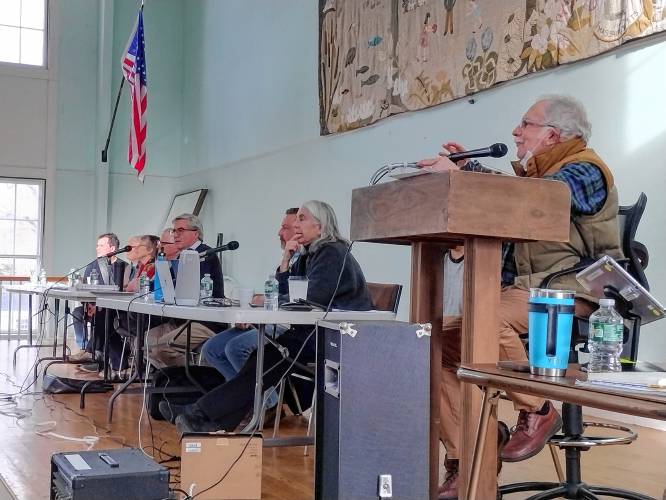 Members of the Advisory Finance Committee and Selectboard at Saturday's Special Town Meeting. In the foreground, seated at the podium, is Town Moderator Bart Wendell.