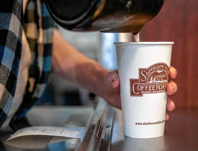 TJ LaLonde pours a cup of coffee at Shelburne Falls Coffee Roasters in Hadley on Thursday.