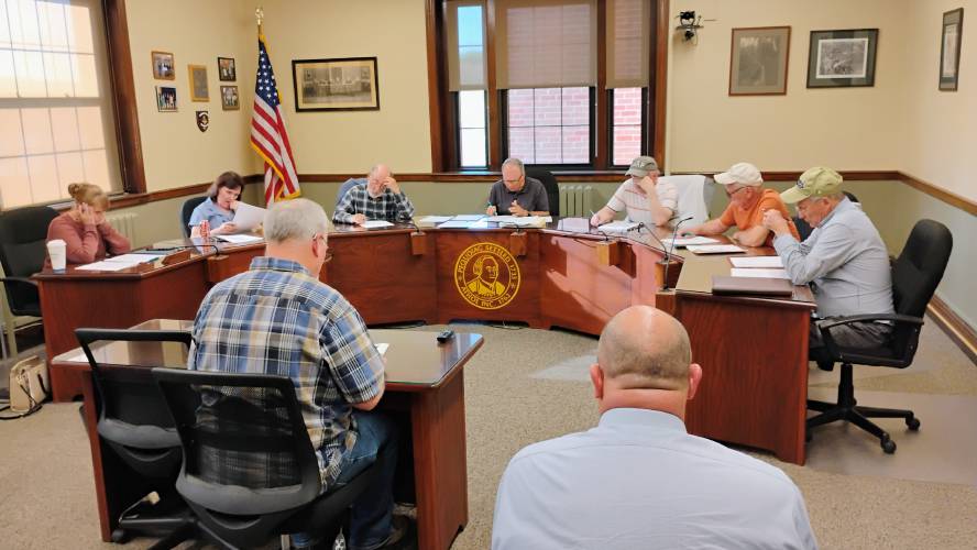 Athol Capital Program Committee chair Jim Smith  (back to camera) answers questions from the Finance and Warrant Advisory Committee Tuesday night.