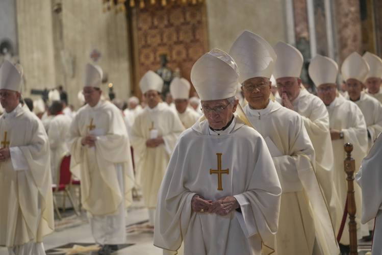 Cardinals leave at the end of a Mass on the eighth of nine days of mourning for Pope Francis, in St. Peter's Basilica, at the Vatican, Saturday, May 3, 2025. (AP Photo/Alessandra Tarantino, File)