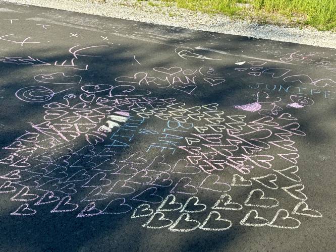 Blake’s two cousins — one nearly 2, the other almost 4 — joined Bill Byrne’s son-in-law to draw with chalk on the road beside the house in Pembroke, a day after the murder-suicide.