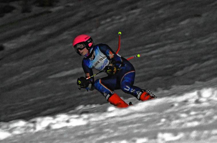 Mohawk Trail’s Emmy Sisum competes in the giant slalom during PVIAC Meet No. 1 at Berkshire East Mountain Resort in Charlemont on Thursday night.