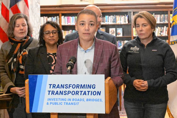 Secretary of the Massachusetts Department of Transportation Monica Tibbits-Nutt, at podium, along with Massachusetts Governor Maura Healey and other state and local officials, at the Field Memorial Library in Conway Thursday afternoon.