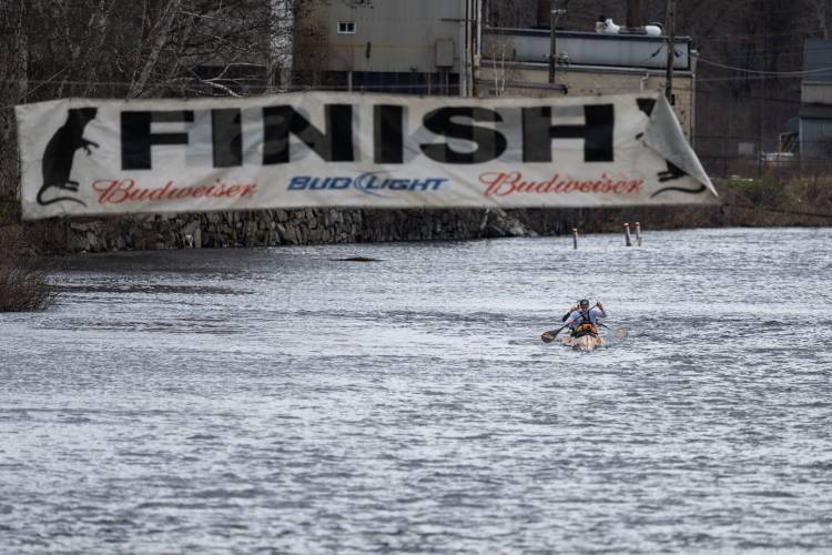Canoe #3, paddled by Ryan Zaveral and Shane MacDowell, were first to cross the finish line in the 2024 River Rat Race.