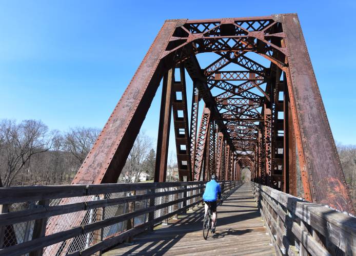 A lone bicyclist crosses the Connecticut River from Deerfield into Montague in 2020. The Franklin Regional Council of Governments is asking the public to complete an online survey with an interactive mapping component to provide information for an updated Franklin County Bike Plan. A lone bicyclist crosses the Connecticut River from Deerfield into Montague in 2020. The Franklin Regional Council of Governments is asking the public to complete an online survey with an interactive mapping component to provide information for an updated Franklin County Bike Plan.