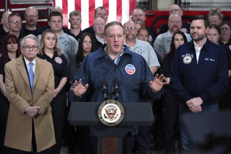 Vice President JD Vance, right, and Ohio Gov. Mike DeWine, left, listen as Environmental Protection Agency administrator Lee Zeldin, center, speaks in East Palestine Fire Station on Feb 3, in East Palestine, Ohio.