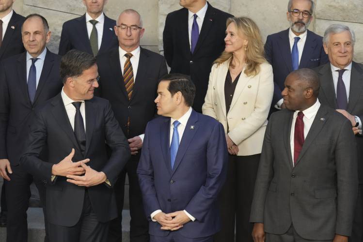 U.S. Secretary of State Marco Rubio, center, and NATO Secretary General Mark Rutte, left, poses with counterparts during a group photo of NATO foreign ministers at NATO headquarters Brussels, Thursday, April 3, 2025. U.S. Secretary of State Marco Rubio, center, and NATO Secretary General Mark Rutte, left, poses with counterparts during a group photo of NATO foreign ministers at NATO headquarters Brussels, Thursday, April 3, 2025.