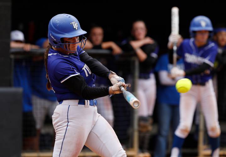 Turners Falls’ Janelle Massey (12) hits an RBI double against Greenfield during the MIAA Division 5 softball state championship Saturday at UMass.
