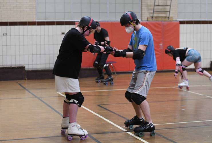 All skill levels participate in the Pioneer Valley Roller Derby practice at Franklin Countys YMCA in Greenfield. 