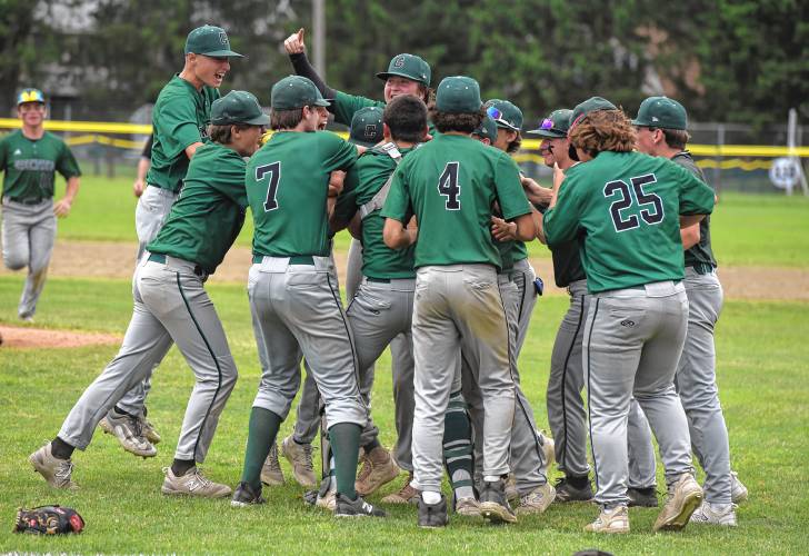 The Greenfield baseball team celebrates the final out of their 7-3 win over Bourne in the MIAA Division 5 quarterfinal round on Saturday at Vets Field in Greenfield.