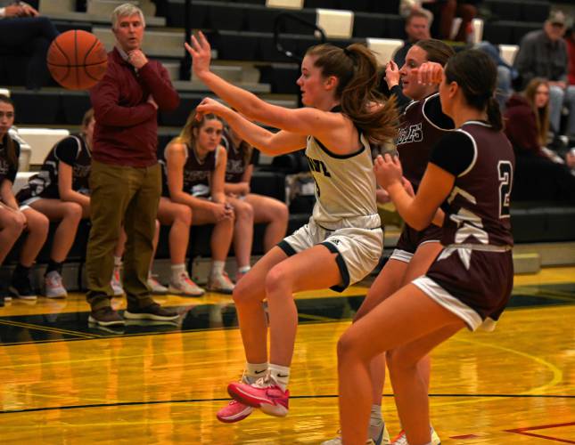 Greenfield’s Anna Bucala makes a pass against Easthampton during Franklin County League North action Friday night at Nichols Gymnasium in Greenfield.