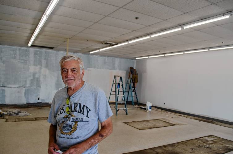 John Dodge in the space which will soon become the North Quabbin Veterans Center. In the background, veteran and friend Raymond Doiron paints a wall. John Dodge in the space which will soon become the North Quabbin Veterans Center. In the background, veteran and friend Raymond Doiron paints a wall.