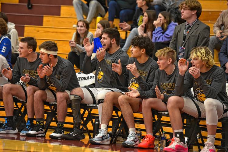 The Pioneer bench cheers on their teammates during the Panthers’ 68-53 loss to Hoosac Valley in the Hoophall Classic at Springfield College’s Blake Arena on Thursday.
