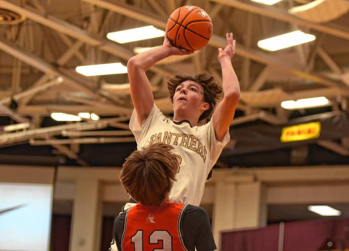 Pioneer’s Kurt Redeker pulls up for a jump shot against Hoosac Valley during the Panthers’ 68-53 loss in the Hoophall Classic at Springfield College’s Blake Arena on Thursday.