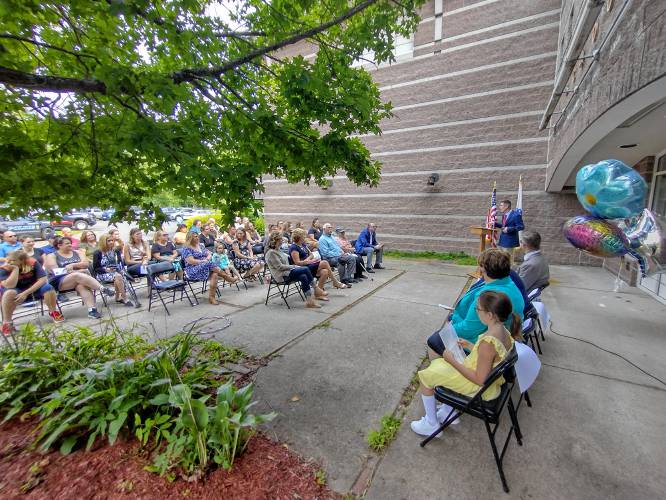 Athol Royalston School District Superintendent Matt Ehrenworth welcomes teachers, administrators, staff, students and local officials to Wednesday's event honoring Royalston Community School for greatly reducing chronic absenteeism.