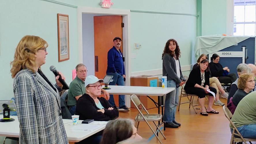 Mahar Regional School District Superintendent Michele Tontodonato answers questions about the district's proposed FY26 budget during Monday's Annual Town Meeting in Petersham.