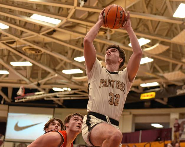 Pioneer’s Josh Wood (32) goes to the basket against Hoosac Valley during the Panthers’ 68-53 loss in the Hoophall Classic at Springfield College’s Blake Arena on Thursday.