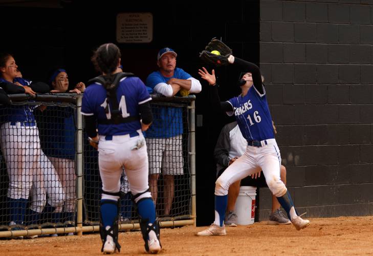 Turners Falls third baseman Autumn Thornton snags a pop-fly in foul territory for an out against Greenfield during the MIAA Division 5 softball state championship Saturday at UMass.