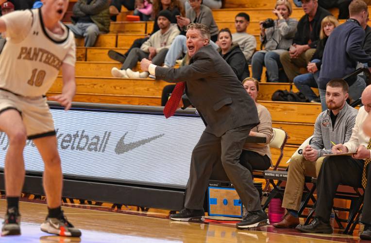 Pioneer head coach Scott Thayer shouts instructions to his team during the third quarter of the Panthers’ 68-53 loss to Hoosac Valley in the Hoophall Classic at Springfield College’s Blake Arena on Thursday.