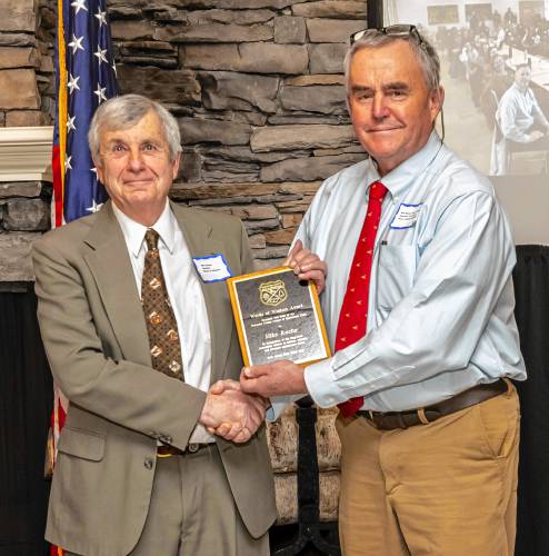 Mike Roche (left) receives the Words of Wisdom Award from Bill Davis, vice president of the Worcester County League of Sportsmen's Clubs at its annual banquet on March 23. Mike Roche (left) receives the Words of Wisdom Award from Bill Davis, vice president of the Worcester County League of Sportsmen's Clubs at its annual banquet on March 23.