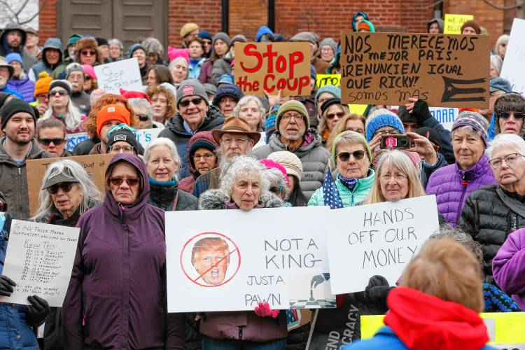 Hundreds of community members demonstrate in Pulaski Park in Northampton during a rally Sunday afternoon organized by the group Northampton Resists.