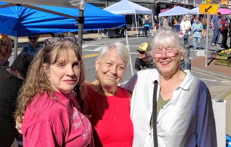 Athol Downtown Vitality Committee Chair Mary Holtorf (right) is joined by (left and center) committee members Diane DiPietro, owner of Tintagels Gate/Flowerland, and Deja Vu Women's Consignment owner Ann Willhite. The annual Fourth Friday events are organized by the DVC.