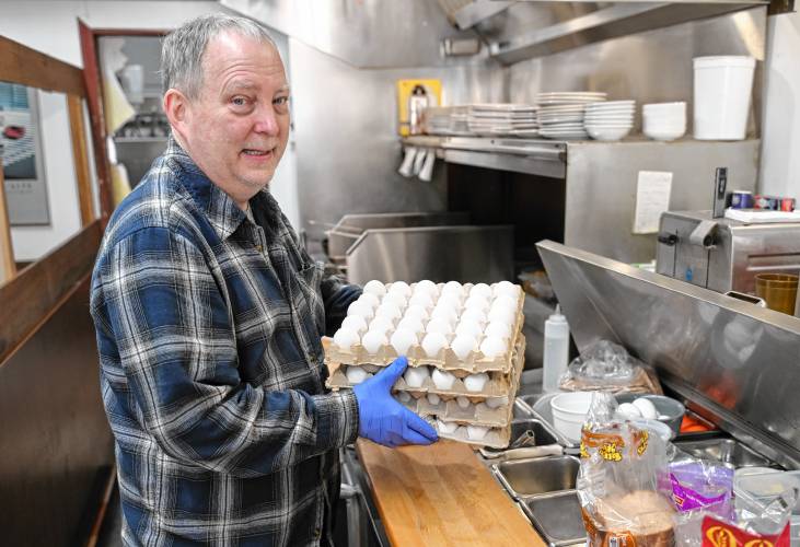 Dan Devine, owner of Brad’s Place in Greenfield, with 120 eggs. Egg prices have soared to record highs, with a nationwide average of $4.95 a dozen in January, up 15% from December, according to the U.S. Bureau of Labor Statistics. 